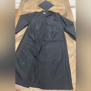 Black graduation gown and cap set. Perfect for graduation photo prop.